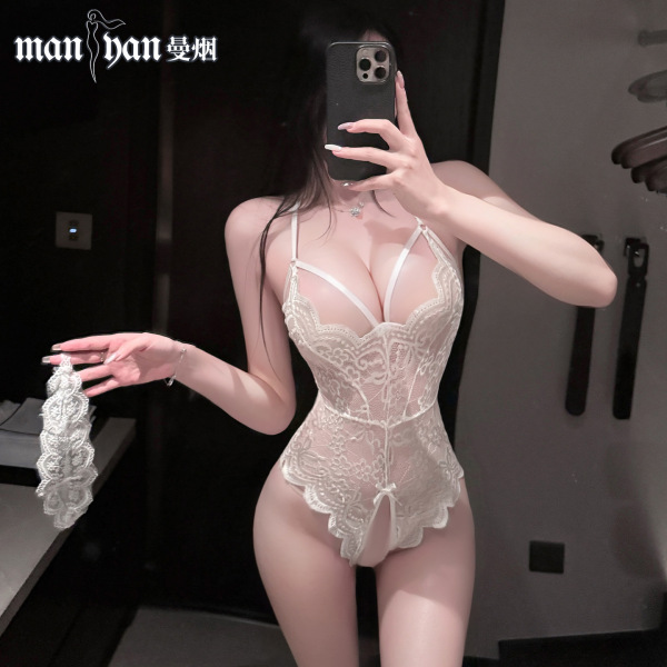 Woman in white lace open-crotch bodysuit with straps, holding matching garter. seductive lingerie set for small bust enhancem...