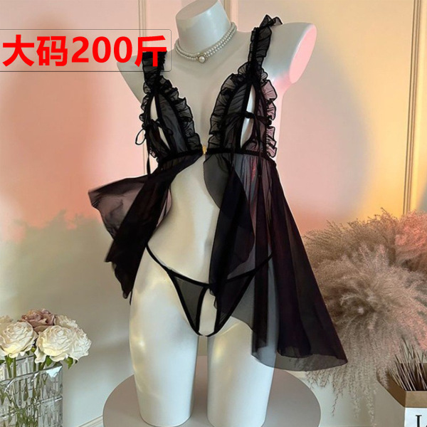 Black sheer lace slip dress with ruffles and built-in support, displayed on mannequin — luxury sensual nightgown for women.