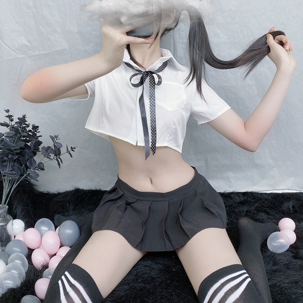 A stylish ensemble featuring a white shirt with a bow tie, paired with a pleated mini skirt, perfect for a playful and sensua...