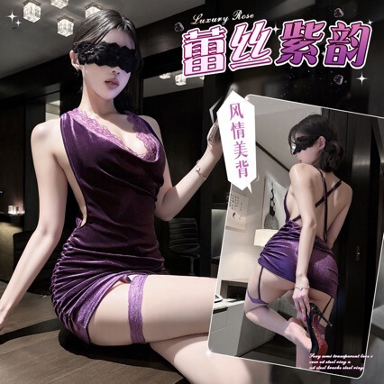Woman wearing purple seductive bodycon lingerie set with lace details and open back design, paired with matching thigh-high s...