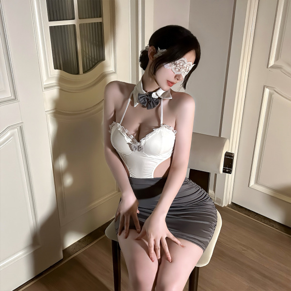 Woman in elegant qingshe ol secretary lingerie set with lace bra, panty, and eye mask, sitting on chair.