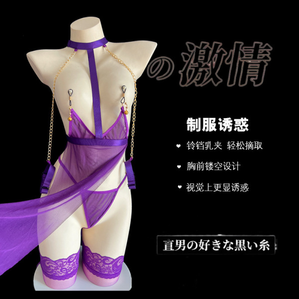 Seductive lace mesh lingerie set with sheer purple fabric, gold chains, and lace garters on a mannequin.