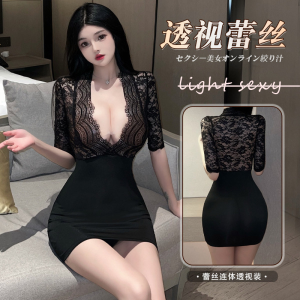 Woman modeling a black lace and satin secretary skirt set with deep v-neckline, sheer sleeves, and bodycon fit for nightclubs...