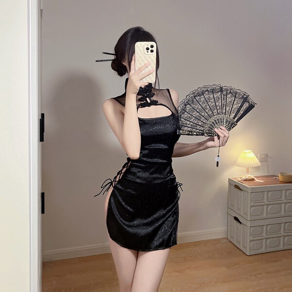 Woman in black sheer cheongsam lingerie set with lace fan, elegant sleepwear for small bust.