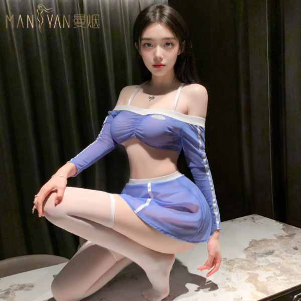 Woman modeling a blue and white football cheerleader costume set with detachable skirt, long sleeves, and thigh-high stocking...