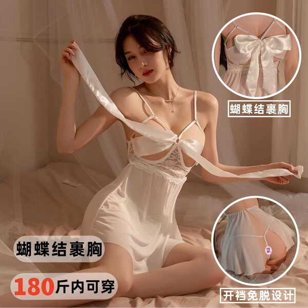 Woman modeling white lace mesh sleepwear set with bow detail bralette and sheer nightgown, plus size design shown in close-up...