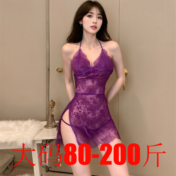 Woman wearing a purple plus size lace bodysuit with sheer mesh and side cut-outs.