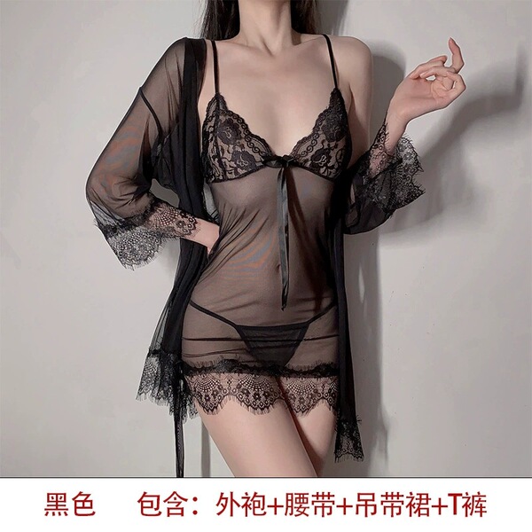 Woman modeling black plus size lingerie set with lace trim sheer slip dress, matching robe, and t-back panties.