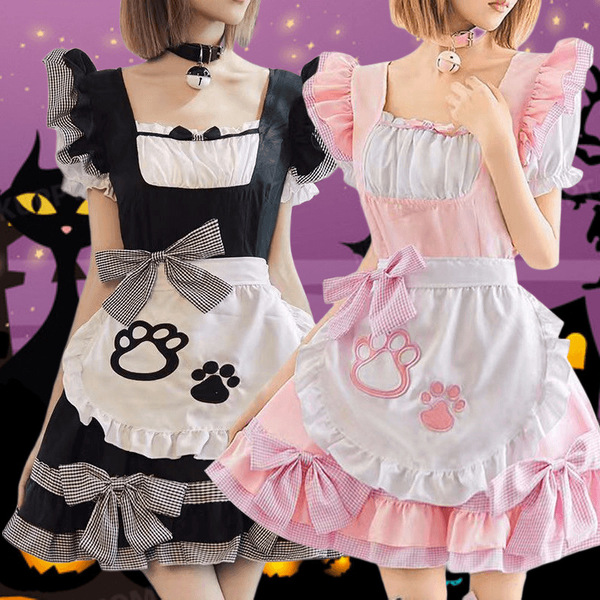 Two women wearing black and white cat girl cosplay costumes, featuring maid outfits with paw prints, ruffled sleeves, and bow...
