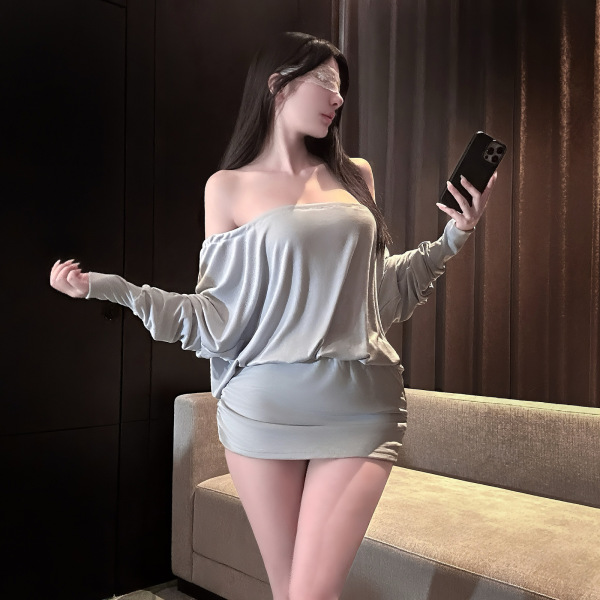 Woman wearing chaomu sensual lingerie dress - one-shoulder backless cutout bodycon mini dress in soft gray, posing with phone...
