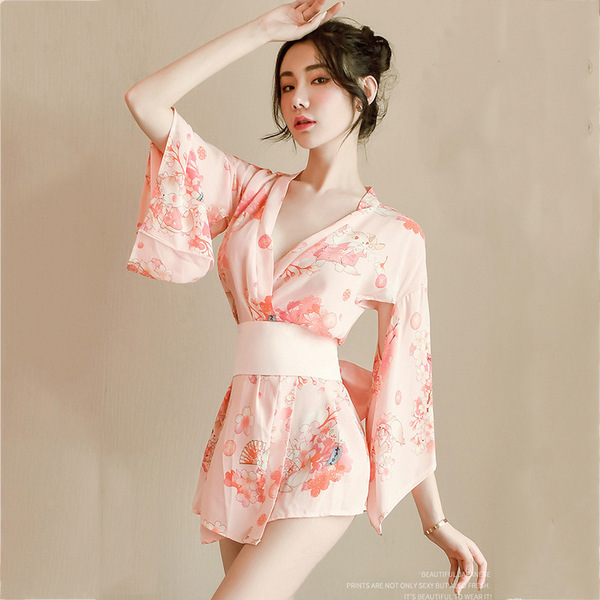A woman models a japanese-style sexy lingerie set featuring a floral pattern, perfect for seductive kimono sleepwear and robe...