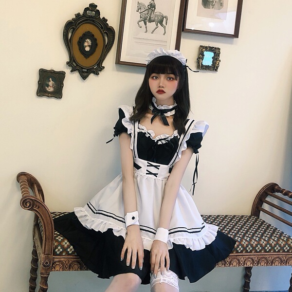 A stylish lolita maid dress featuring black and white colors with ruffles, perfect for cosplay or fashion.