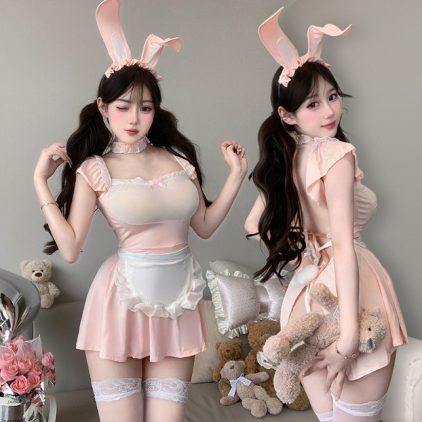 Pink bunny maid costume with lace trim, sheer mesh bodice, white apron, and matching ears. adjustable straps for a snug fit.