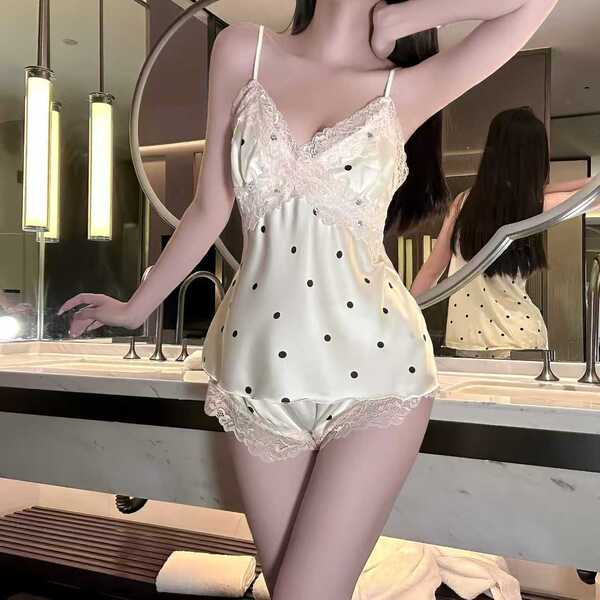 Sexy lace babydoll sleep set featuring polka dots, delicate lace trimmings, and built-in pads for elegant at-home role play.