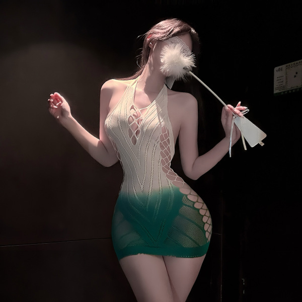 Woman in sheer mesh lingerie set with tear-away design, holding a feathered accessory, exuding elegance and sensuality.