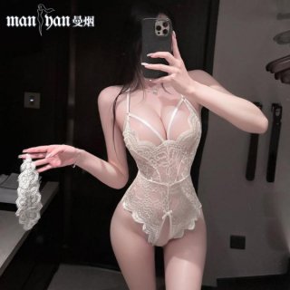 Woman in white lace bodysuit with open crotch and straps, holding matching garter, showcasing seductive lingerie design.