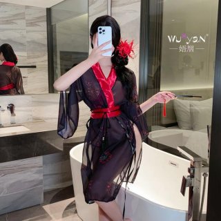 A woman poses in a bathroom wearing a sheer hanfu-inspired erotic robe, featuring red accents and floral patterns, capturing ...