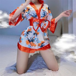 A woman poses wearing a japanese kimono costume set, featuring vibrant floral patterns and orange accents. the outfit include...