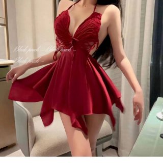 Woman wearing red butterfly lace sleeveless sleep dress with sheer back and bow detail, romantic spring lingerie set.