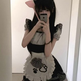 A person wearing a cute maid dress featuring a black and white checkered apron with cat paw designs, perfect for cosplay or a...