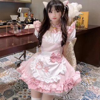 A cute girl wearing a pink japanese maid cosplay dress with cat ears and paw prints, perfect for a soft girl aesthetic.