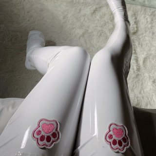 Shiny tight leggings featuring cute pink cat paw patches, perfect for cosplay or adding a kawaii touch to any outfit.