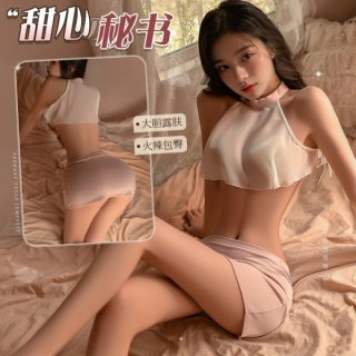 Woman modeling mannyan sexy lace bodysuit set with sheer off-shoulder bralette and high-waisted mini skirt on bed.