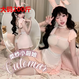 Model wearing plus size pink bunny girl costume with sheer mesh, ruffles, and lace trim - sexy cosplay maid outfit.