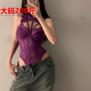 Woman modeling purple lace lingerie set with sheer bodysuit and jeans, plus size seductive sleepwear costume.