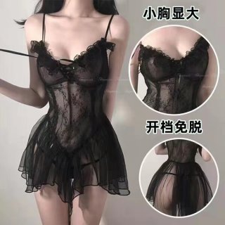 Woman wearing black sheer lace sleepwear set with mesh camisole and backless slip dress, featuring ruffled hem and open-crotc...
