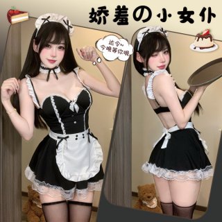 Model wearing black lace maid outfit with white apron, headpiece and stockings from soul bond sexy nightgown collection.