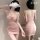 Woman wearing pink bodycon skirt and sheer stockings, showcasing seductive lingerie set for couples.