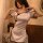 Woman modeling a white vintage-inspired qipao lingerie set with black trim and floral pattern, featuring a short retro chines...