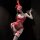 Woman in red lace bodysuit with bunny ears, sheer mesh, pearl chain detail, and thigh-high stockings.