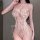 Woman wearing a cherry blossom lace bodysuit with heavy embroidery and deep v plunge, featuring mesh fabric and side ties.