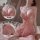Woman wearing pink lace sleep dress with push-up cami top, body-conscious fit, elegant trim, and semi-sheer fabric.