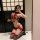 Woman modeling red luxury pure-yu silk hanfu bodysuit set 7718, sheer sexy lingerie with open-crotch design.