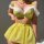 Woman wearing yellow lace bra and floral mesh mini skirt from temu pure & playful sexy lingerie set.