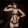 Woman modeling black lace open-crotch bodysuit with matching mask, choker, and garters. bold lingerie set for date night or s...