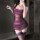 Woman wearing purple lace-trimmed bodysuit with sheer bodycon skirt, matching thigh-highs — modest yet sexy lingerie set for ...