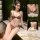 Woman modeling leopard print lingerie set with halter bra and thong, showing front and back views for a sensual look.