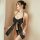 Woman wearing black lace halter neck bodysuit with bow detail and backless thong set, premium erotic lingerie for women.