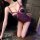 Woman wearing feiniao kuiyue sexy lace bodysuit with sheer mesh, open-crotch harness design and delicate floral trim.