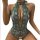 Sheer green lace lingerie set with intricate floral patterns and a halter neck design, perfect for intimate sleepwear.