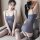 Woman modeling gray pure & playful lingerie set - seductive secretary style sleepwear, featuring a sleek slip dress and strip...