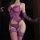 Woman wearing purple lace lingerie set with sheer bodysuit, adjustable ties, and waist-cinching design.