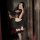Feiniao moon gazer sexy lingerie set featuring a lace fishbone corset top and crop bra, paired with a black mini skirt and th...