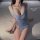Woman wearing pure allure lace cutout high-waist split dress by qqny, a seductive lingerie style designed to enhance small bu...