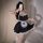 Sexy maid costume featuring a black lace babydoll dress with detachable apron, headband, and stockings.