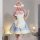 A woman models an adult womens cosplay maid dress, featuring a cute design with pastel colors, ruffles, and a large bow. perf...